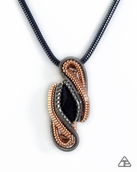 Ebony Titanium and Rose Gold Wire Wrapped Pendant